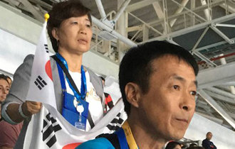 Taekwondo player keeps promise for her mother