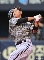 김주성, 헬멧도 못이기는 파워로