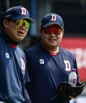 김기연, 더위에 공 대신 냉수