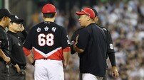 “아웃타이밍, 주자와 베이스 거리 있었다”…3루수 출신 이범호 감독, 퇴장 각오하고 항의한 이유는? [SD 사직 브리핑]