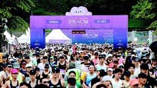 5000명 봄비 속 질주…‘하트시그널 러닝페스타’ 도심 달궜다