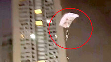 조회수에 눈 멀어…아파트 옥상서 낙하산 타고 뛰어내렸다