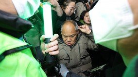 전장연, 시청역서 출근길 지하철 탑승 시위… 이동 권리 보장 촉구