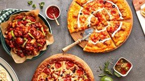 고물가에도 30년째 피자 한 판 ‘1만 원’