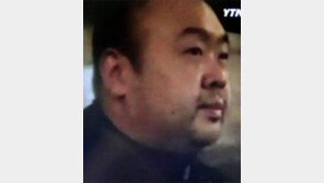 굳은 표정 김정남, 베이징 거리서 목격