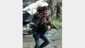 특종 대신 아이 생명 구한 사진기자