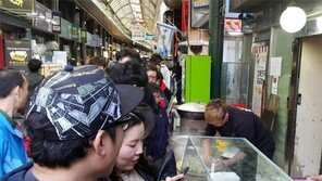 한중 해빙 모드… 신포국제시장 다시 북적