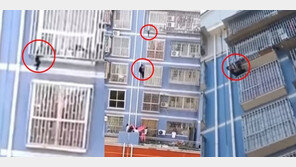 [영상] 5층 방범창에 걸린 아이 구한 대륙의 ‘스파이더맨’