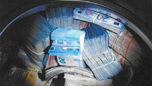 ‘돈세탁’한 35만유로 진짜 세탁기에 감춘 남성 체포