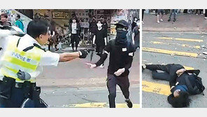 홍콩경찰, 시위대에 실탄 총격… 1명 중태