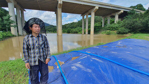 장대비속 똘똘 뭉쳐 저수지 붕괴 막았다