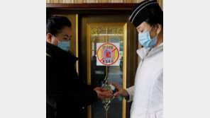 北 평양 국숫집에서도 “마스크 쓰고 손소독은 필수”