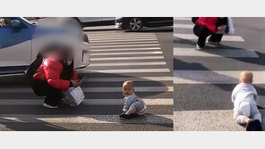 차 쌩쌩 달리는데…횡단보도에 아기 내려놓고 영상 찍는 中여성 (영상)