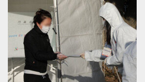 사전투표한 확진자 “현장 자체를 믿을 수 없었다”