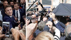 재선 성공 뒤 시장 찾은 마크롱… 토마토 맞을 뻔