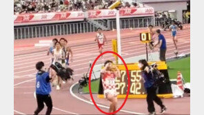 달리던 중 카메라 줄에 목이 ‘컥’…봉변당한 日육상선수