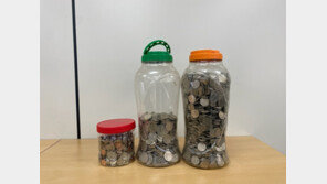 “작은 도움 되길”…동전 가득 69만원 담긴 병 두고 사라진 남성