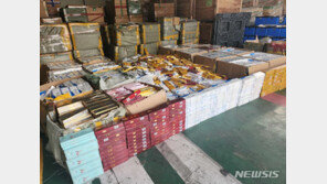 ‘담요로 위장’ 위조 담배 18만갑 조직적 밀수 일당 10명 검거