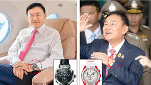 30억짜리 시계 찼던 탁신, 방콕 도착하자 36만원짜리로 바꿔