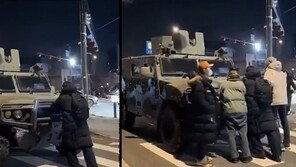 계엄 장갑차 막은 부부, 李 임명장 수여자로