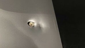 브라질 무장강도 공격, 노트북에 총알 박혀 목숨 구했다