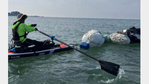 카약타고 태안 바다 청소… 200명이 쓰레기 5t 수거