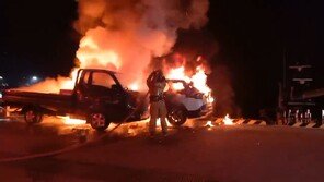 주행 중 SUV 화재…트럭과 충돌 후 바다 추락해 2명 부상