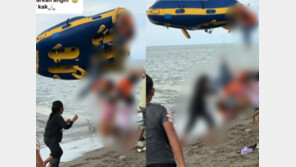 “사람이 허공으로 튕겨나갔다”…해변 돌진한 보트 솟구치며 뒤집혀