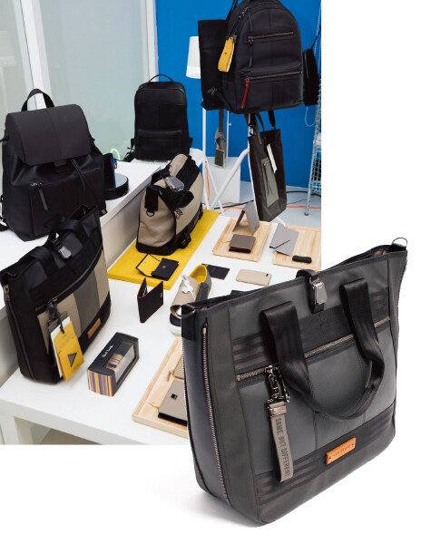 폐자동차 폐기물을 소재로 만들었다고는 믿기지 않을 정도로 세련되고 고급스러운 모어댄 ‘컨티뉴’ 제품들. 가방 가격은 20만~30만 원 선이다.[사진 제공  모어댄,조영철 기자]