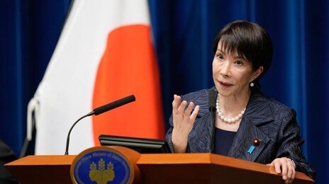 日총리 “집단자위권”에… 中총영사 “목 베겠다”