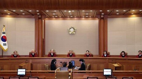 헌재 “동원훈련 통지서 전달 의무 위반 가족 처벌 규정 위헌”