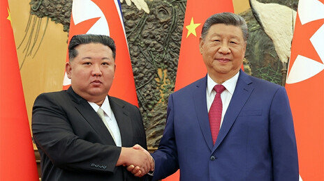 시진핑 “외교·군대 등 교류 강화해야” 김정은 “하나의 중국 지지”