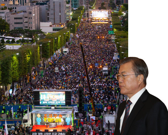 지난해 10월 5일 서울 서초구 서초대로에서 조국 당시 법무부 장관을 옹호하는 촛불문화제가 열린 가운데, 보수단체 회원들이 경찰 저지선을 사이에 두고 맞불집회 형식의 ‘조국 구속 태극기 집회’를 개최하고 있다. [박해윤 기자]