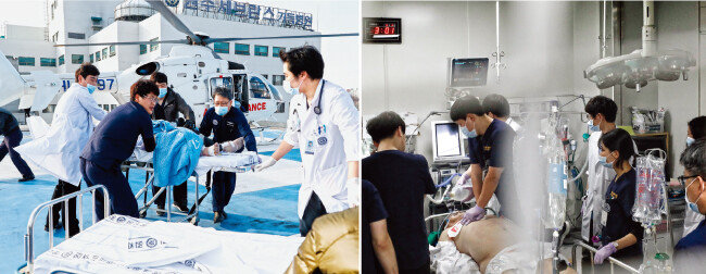 이강현 교수(오른쪽에서 두 번째)가 심정지 환자를 침대에 실어 권역응급센터 내 응급소생실로 옮기고 있다(왼쪽). 이 환자는 병원에서 30분 이상 심폐소생술을 받았으나 끝내 숨을 거뒀다.[박해윤 기자]