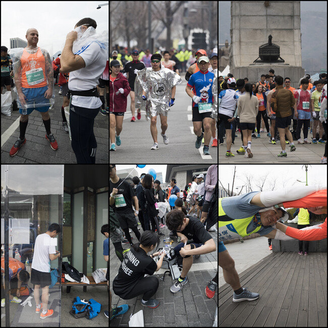 몸을 풀고 다리에 테이핑을 하면 달리기 준비 완료. [조영철 기자]