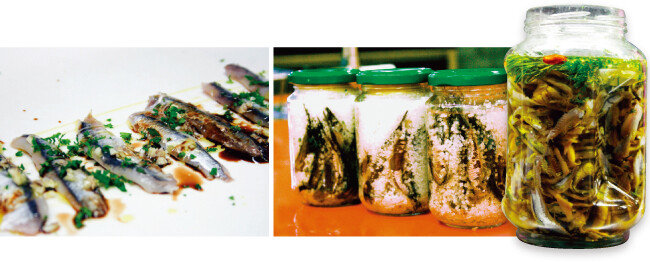 마늘, 레몬즙, 허브와 곁들여 먹는 안초비(왼쪽). 안초비는 소금에 숙성시킨 멸치를 허브 오일에 담가 만든다.