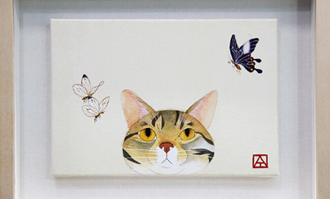 백산동물병원 곳곳에는 보호자가 기르는 고양이를 그린 그림들이 걸려 있다. 사진은 김명철 원장이 기르던 고양이를 직접 그린 그림. [지호영 기자]