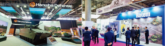 ‘유로사토리(Eurosatory) 2022’에 참가한 한화디펜스(왼쪽)와 현대로템의 부스. [사진 제공 · 한화디펜스, 사진 제공 · 현대로템]