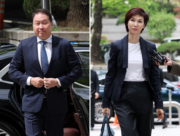 최태원(왼쪽) SK그룹 회장과 노소영 아트센터 나비 관장이 4월 16일 서울 서초구 서울고등법원에서 열린 이혼소송 항소심 2차 변론기일에 출석하고 있다. [뉴스1]