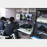 13일 오후(현지시간) 아랍에미리트연합(UAE) 아부다비 뉴욕대학교에서 중국 관영매체 CCTV 중계진이 대한민국 선수들이 훈련하는 모습을 생중계하고 있다. 2019.1.13/뉴스1 © News1