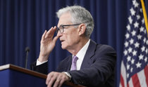 Fed slashes rates by a half point, first cut in 4.5 years