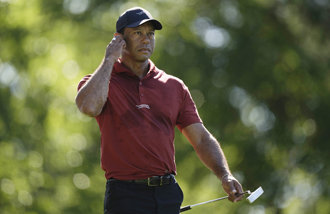 Woods determined to compete in remaining major tournaments
