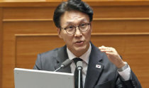 合併にブレーキ、金民錫首相に追い風　「党内での影響力拡大」