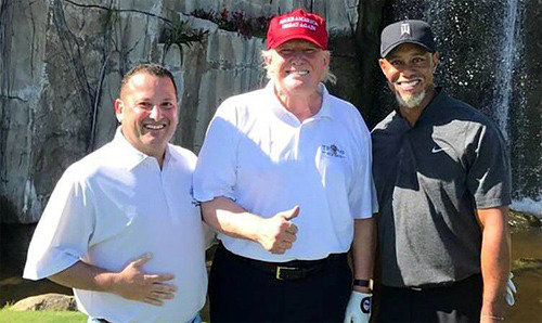 Trump tees off with Tiger Woods