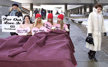 Demonstrators against Fur Coats and Woman in the Fur Coat