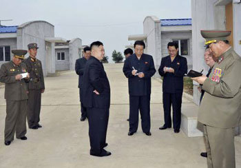 N. Korean leader visits mushroom factory amid offer of inter-Korean talks