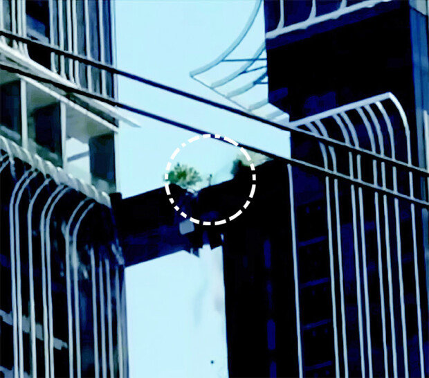 Korean man leaps across Bangkok condo sky bridge during quake