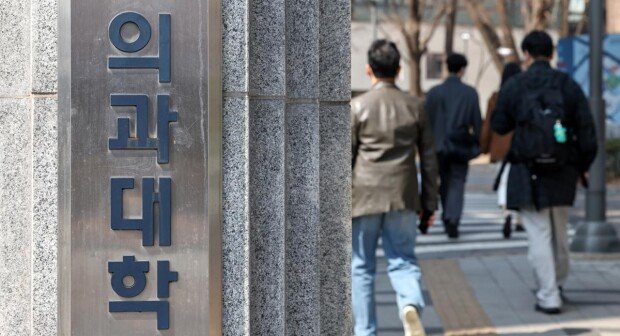 The passing grade for local medical schools decreases by 1.11