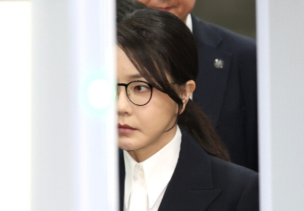 Former first lady accused of posts-for-luxury scheme