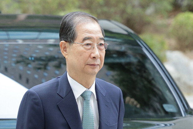 Former PM Han faces arrest over martial law case